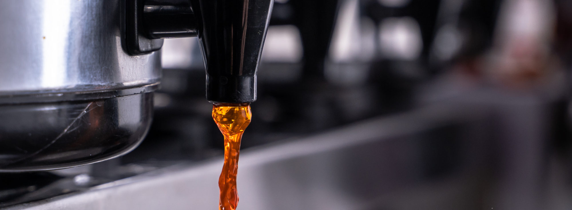 iced tea flows from a convenience store beverage dispenser